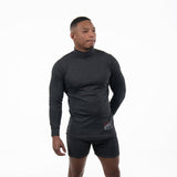 Man standing with his feet apart wearing a flame-resistant boxer brief with 3" inseam. The boxer brief is grey in color with a flat flame-resistant elastic band.