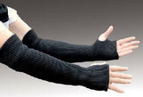 Side view of woman's arms outstretched in front of her wearing Seraphina Safety Apparel flame-resistant, heat-resistant protective sleeves with thumb hole opening.